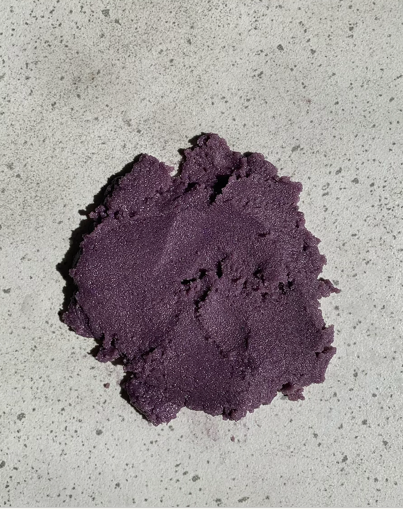 Purple Bruny Island Sand Exfoliating Scrub - Lavender sits on a gray concrete surface